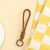 Llavero de Peluche de Cuerda Tejida a Mano de Color Sólido Lanyard Corto Portátil para Teléfono Colgante Decorativo para Bolso