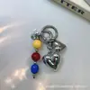 Estilo Ins Bloques de Color Corazón de Caramelo Colgante para Funda de Teléfono Soporte para Tarjetas AirPods Decoración Versátil Creativa Colgante para Bolso de Moda