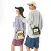 Bolso cruzado pequeño bolso de un solo hombro estilo coreano mochila para mujer estudiante mochila casual personalidad bolso para teléfono tela Oxford hombre un solo hombro