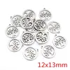 Accesorios para joyería acero inoxidable colgante pequeño colgante estrella luna mariposa flor árbol gato multiestilo al por mayor 0.3g