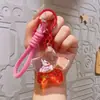 Figura Creativa de Gato de la Fortuna de Acrílico Llavero de Botella con Arena Líquida con Colgante de Estrella de Cinco Puntas Flotante