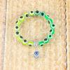 Aleación Palma Hueca Ojos Azules Colorido Color Mezclado Colgante de Cuentas Pulsera Elástica Joyería Simple para Pareja en stock