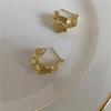 Pendientes de botón con textura irregular de papel de estaño, pasador de plata de ley S925, pendientes geométricos, pendientes de temperamento simple europeo y americano, diseño original
