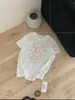 Camiseta Base de Manga Corta para Mujer 2026 Verano Estilo Delgado Reductor de Edad Versátil Estampado de Dibujos Animados Algodón con Sensación de Hielo Versión Coreana