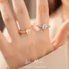 Anillo abierto ovalado de zirconita chapado en oro real de 18 quilates, estilo de nicho de alta gama, joyería versátil y elegante de lujo ligero