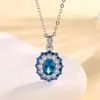 2024 nueva joyería Huabi cobre chapado en oro simulación azul cristal afilado ovalado traje piedra principal femenina 6*8 al por mayor