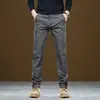 Pantalones casuales negros de tecnología de tres pruebas para hombre de otoño e invierno, pantalones largos de algodón elásticos holgados de pierna recta con forro polar