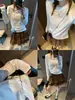 Además, la nueva camiseta de otoño estilo coreano con bordado de lazo y mangas raglán texturizadas MQ1614