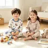Novos conjuntos de pijamas térmicos casuais de outono e inverno para meninos e meninas, com estampas de desenhos animados