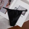 Nova Tanga Sexy de Cor Sólida Macia de Seda de Gelo para Mulheres de Cintura Baixa Sem Costura Divertida com Pom-Pom Fofa Calcinha T para Mulheres