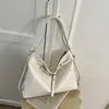 Bolso tote de color liso de gran capacidad, nuevo diseño de moda para principios de otoño de 2026, bolso de hombro nicho de alta apariencia para mujer