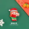 Lindo broche de Navidad, accesorio DIY para las mochilas de los estudiantes de primaria, insignia de dibujos animados de Santa Claus, pequeño regalo