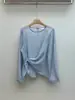 Camisa suéter coreana chic asimétrica ligeramente transparente de cuello redondo 2026 primavera y otoño elegante estilo francés de manga larga ajustada