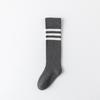 Otoño e invierno nuevos calcetines hasta la pantorrilla para niños calcetines de tres barras estilo académico calcetines de algodón peinado calcetines de felpa para estudiantes niñas