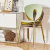 Silla de comedor creativa para el hogar nórdico, silla de plástico moderna minimalista de diseñador, estilo crema, sensación avanzada, apilable, con respaldo de plástico