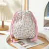 Nueva bolsa de cordón acolchada transfronteriza, bolsa de almacenamiento portátil y elegante, bolsa de maquillaje de cordón floral estilo coreano perezoso