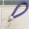 Llavero de cuerda de cuero trenzado simple creativo colgante de muñeca linda accesorios de llave para parejas tendencia regalos pequeños venta al por mayor