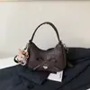 Coleção Outono 2026: Bolsa de Mão de Luxo para Mulheres, Bolsa de Ombro Tendência Estilo Coreano, Bolsa Transversal com Laço, Bolsa Versátil de Axila