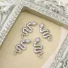 Accesorios de circonita para manicura transfronterizos, muy brillantes, tridimensionales, forma de serpiente, lujo ligero, oro, envoltura de serpiente, diamantes de uñas ponibles