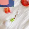Árbol de Navidad transfronterizo pompón verde hoja de vidrio colgante cordón para teléfono móvil funda de teléfono accesorio de decoración con cuentas