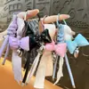 Pingentes de Bolsa Transfronteiriços, Decorações de Laço de Couro, Chaveiros de Coração, Correntes para Celular, Cordões, Pequenos Acessórios, Atacado de Comércio Exterior