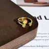 2025 Nuevo Celebridad de Internet China Vintage Dibujo de Alambre Moda Exquisito Anillo para Mujer Gradiente Chapado en Oro Esmalte Mariposa Lujo Ligero Anillo de Dedo