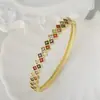 Fornecimento transfronteiriço de moda europeia e americana, banhado a cobre, cor de ouro real 18k, retenção de cor, micro cravação de zircônia colorida, pulseira, pulseira da moda mais vendida