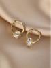Pendientes sencillos de lujo con incrustaciones de diamantes, súper brillantes y ligeros, nuevos pendientes de hebilla de oreja de alta calidad con diseño de nicho para mujer de 2023.