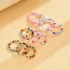 Anel Elástico de Miçangas de Arroz de Cores Misturadas Estilo Japonês e Coreano Moda Elegante Estilo Ins Conjunto de 10 Peças de Anéis Coloridos de Miçangas de Arroz