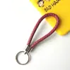 Llavero creativo llavero de cuerda de cuero cordón para llaves colgante de joyería cordón tejido fábrica de cuerda de cuero venta al por mayor