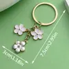 5 Piezas/Set Venta Caliente Transfronteriza Día de San Valentín Flores de Dibujos Animados Margaritas Flor de Cerezo Colgantes Pequeños Llaveros Bolsas Joyería Regalos
