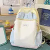 Nova mochila color block para estudantes com orelhas de coelho fofas, mochila escolar de alta aparência de desenho animado para meninas, mochila leve transfronteiriça para atividades ao ar livre