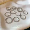 Set de anillos redondos retorcidos incrustados de diamantes metálicos, simple y elegante, anillo versátil, nicho de lujo ligero, sensación de alta gama, joyería para mujer