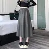 Nueva colección otoño/invierno 2026: falda versátil y elegante de longitud media de piel sintética, falda larga para mujer, falda de línea A con cintura elástica