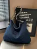 Bolsos de mezclilla al por mayor para exportación, nuevos diseños elegantes para mujer, gran capacidad, adecuados para el trabajo, se pueden llevar debajo del brazo o como bolso de hombro