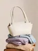 Bolso de axila para mujer de estilo coreano simple, nuevo para primavera-verano, de piel de cordero, gran capacidad, bolso de hombro de cuero genuino de alta gama para ir al trabajo
