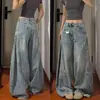 Jeans casuales estilo retro americano rotos con dobladillo curvo y deshilachado para mujer, pantalones largos de pierna ancha sueltos de cintura alta para primavera/verano