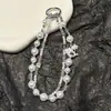 Nueva Cadena para Teléfono de Aleación de Cristal con Poni y Correa de Muñeca de Perla, Cordón de Alta Gama para Bolsos, Doble Capa y Exquisito