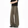 Calça casual da moda em retalhos de cor sólida para homens, calça básica de perna curva estilo americano para outono, calça de cintura com cordão, drapeada, de comprimento total, high-street