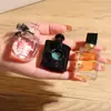 Dky Portátil Versión Q Negro Ya Reversal Encounter Perfume para Hombres y Mujeres Fragancia de Larga Duración Fresca y Natural Gotero de Una Pieza Venta al por Mayor
