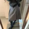 Falda midi plisada de lana estilo coreano 2026 otoño elegante para ir al trabajo estilo universitario de lana para mujer