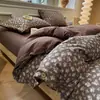 Juego de cuatro piezas de gasa de doble capa estilo botón grado A, funda nórdica y funda de almohada de algodón puro, adecuado para dormitorios de estudiantes, juego de cama de tres piezas