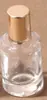 En Stock Botella de Vidrio Transparente de 10 ml con Hombro Plano y Ruedita, con Colgante de Cruz, Botella para Aceites Esenciales, Botella de Perfume, Botella para Crema de Ojos, Botella para Aceite de Labios