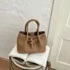 Bolsa de Mão Feminina para o Trabalho Primavera 2026 Nova Bolsa Saco Simples Moda Casual Coreana Bolsa Transversal