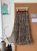 Falda plisada de malla estilo retro coreano, relajada, con estampado paisley, para mujer, otoño e invierno, vintage, holgada, de dobladillo ancho, línea A
