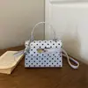 Bolsa Kelly para Mujer 2026 Nuevo Estilo de Moda Verano Lunares Súper Popular para el Trabajo Bolso Tote Pequeño Sensación Cotidiana Bolso de Hombro Único Cruzado