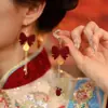 Pendientes de la Fortuna de Año Nuevo para Mujer 2026 Nuevos Pendientes de Botón Rojos Festivos Populares Diseño Único Pendientes de Gama Alta