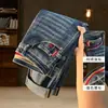 Jeans de hombre de alta gama, estilo vintage de otoño, desgastados, corte slim, pierna recta, pantalones casuales con un diseño de estampado moderno