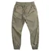 Calças de perna casuais de secagem rápida fina masculina de verão Calças esportivas estilo coreano Moda solta de secagem rápida Calças de perna com cadarço