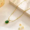 El producto transfronterizo más vendido de Amazon: Elegante collar ovalado de acero de titanio completo con piedra de gato para mujer, moderno y versátil, un regalo de alta gama
